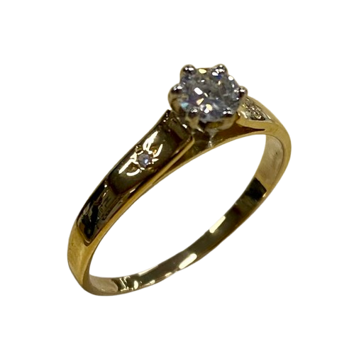 Ladies 18ct Yellow & White Gold 3 Stone Diamond Ring. Round Brilliant Cut 6 Claw Tapered Collet White Gold On A Yellow Gold Under Rail Diamond, With 2 Single Cut Diamonds Star Grain Set In Flat Top Swept Up Shoulders. TDW 0.32ct. Size N/7, With Valuation Certificate (NG 132482)