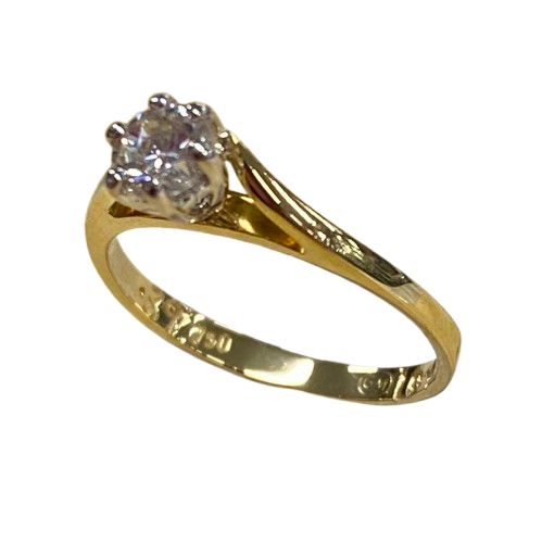 Ladies 18ct Yellow Gold Single Stone Diamond Ring. Round Brilliant Cut Surrounded 6 Claw Wire Tapered Collect Set On a Yellow Gold Under Rail With Pointed Cross Over Swept Up Shoulders. TDW 0.39ct. Size L/5.5, With Valuation Certificate – (NG 102862)