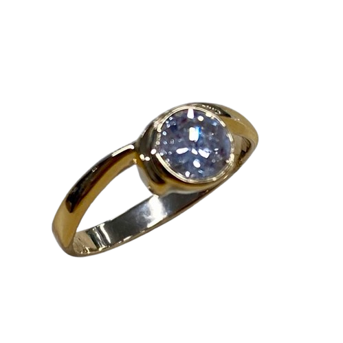 Ladies 18ct Yellow & White Gold Single Stone Diamond Ring. Round Brilliant Cut Diamond Rub Over Set With Part Wrap Around Shoulders. TDW 0.55ct. Size H/4.5, With Valuation Certificate (NG 143973)