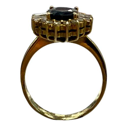 Ladies 9ct Yellow Gold 1.70ct Oval Australian Dark Blue Sapphire Ring, With 12 Surrounded with Round Brilliant and 6 Baggett Diamond. TDW 0.36ct & 1.07ct Sapphire. With Valuation Certificate.