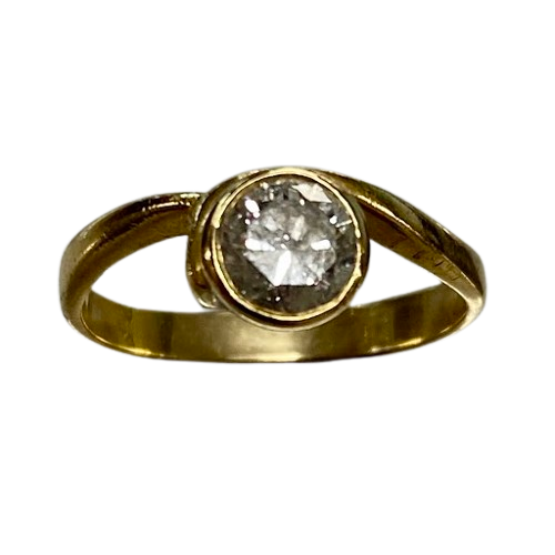 Ladies 18ct Yellow & White Gold Single Stone Diamond Ring. Round Brilliant Cut Diamond Rub Over Set With Part Wrap Around Shoulders. TDW 0.55ct. Size H/4.5, With Valuation Certificate (NG 143973)