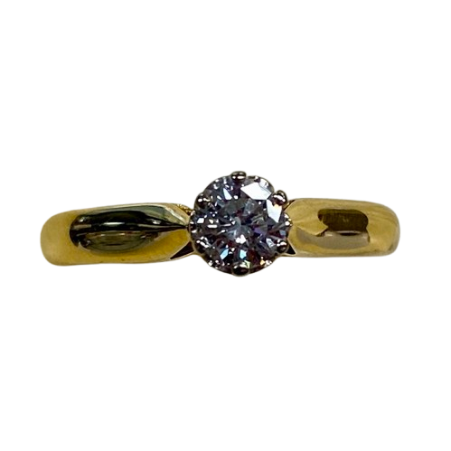Ladies 18ct White & Yellow Gold Stone Diamond Ring. Single Round Brilliant Cut White Gold 6 Claw Set With Tapered Scroll Pierced Out Collet With Pointed Swept Up Shoulders. TDW 0.31ct. Size M/6.5, With Valuation Certificate (NG 99365)