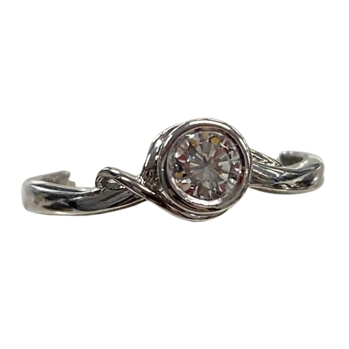 Ladies 18ct White Gold 3 Ring Set. Rub Over Set 0.30ct Round Brilliant Cut Diamond, With 7 Round Brilliant Cut Channel Set In Fitted Bands Each Side. TDW 0.72ct. Size O With Valuation Certificate.