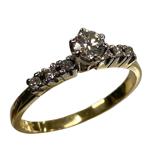 Ladies 18ct Yellow & White Gold Diamond Ring. Single Round 0.20ct Brilliant Cut White Gold Claw Set Diamond, With 6 Round Brilliant Cut White Gold Claw Set Diamonds. TDW 0.29ct. Size L&1/2 . With Valuation Certificate.