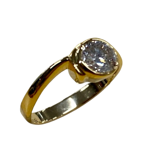 Ladies 18ct Yellow & White Gold Single Stone Diamond Ring. Round Brilliant Cut Diamond Rub Over Set With Part Wrap Around Shoulders. TDW 0.55ct. Size H/4.5, With Valuation Certificate (NG 143973)