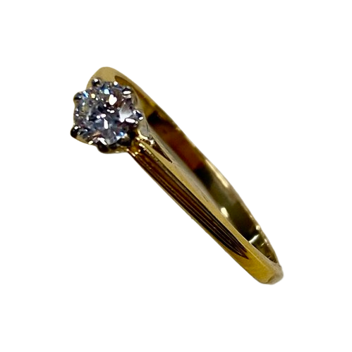 Ladies 18ct Yellow & White Gold Single Stone Diamond Ring. Round Brilliant Cut Diamond White Gold 6 Claw Set With Tapered Pierced Out Collet On Flat Yellow Gold Under Rail With Grooved Swept Up Shoulders. TDW 0.55ct. Size H/4.5, With Valuation Certificate (NG 63624)
