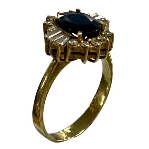 Ladies 9ct Yellow Gold 1.70ct Oval Australian Dark Blue Sapphire Ring, With 12 Surrounded with Round Brilliant and 6 Baggett Diamond. TDW 0.36ct & 1.07ct Sapphire. With Valuation Certificate.