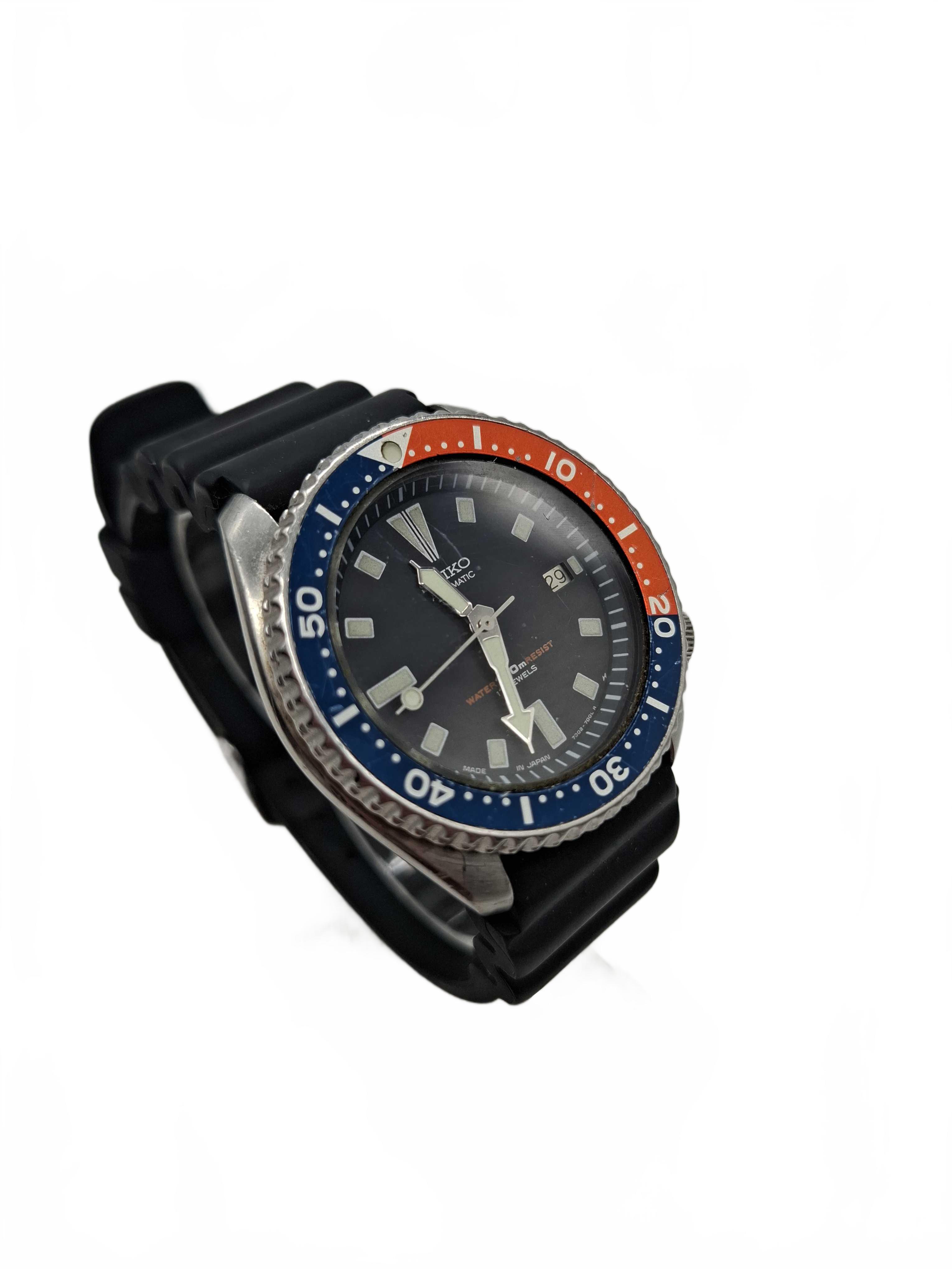 Seiko Watch Model 7002-700J Black Rubber Band Pepsi Seiko (WR 1430050)