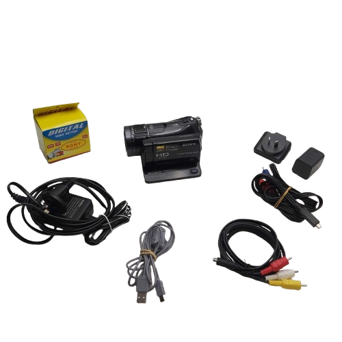 Sony Camera HD-CX7 Black In Box With Charging Base/Zoom Lens/ 2x Sony batteries/ AV Cords/ Booklets (NA 1343612)