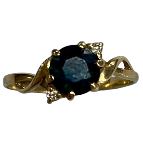 Ladies 9ct Yellow Gold Accent Ring Crossover Detailing with Blue Centre Sone. Size 6