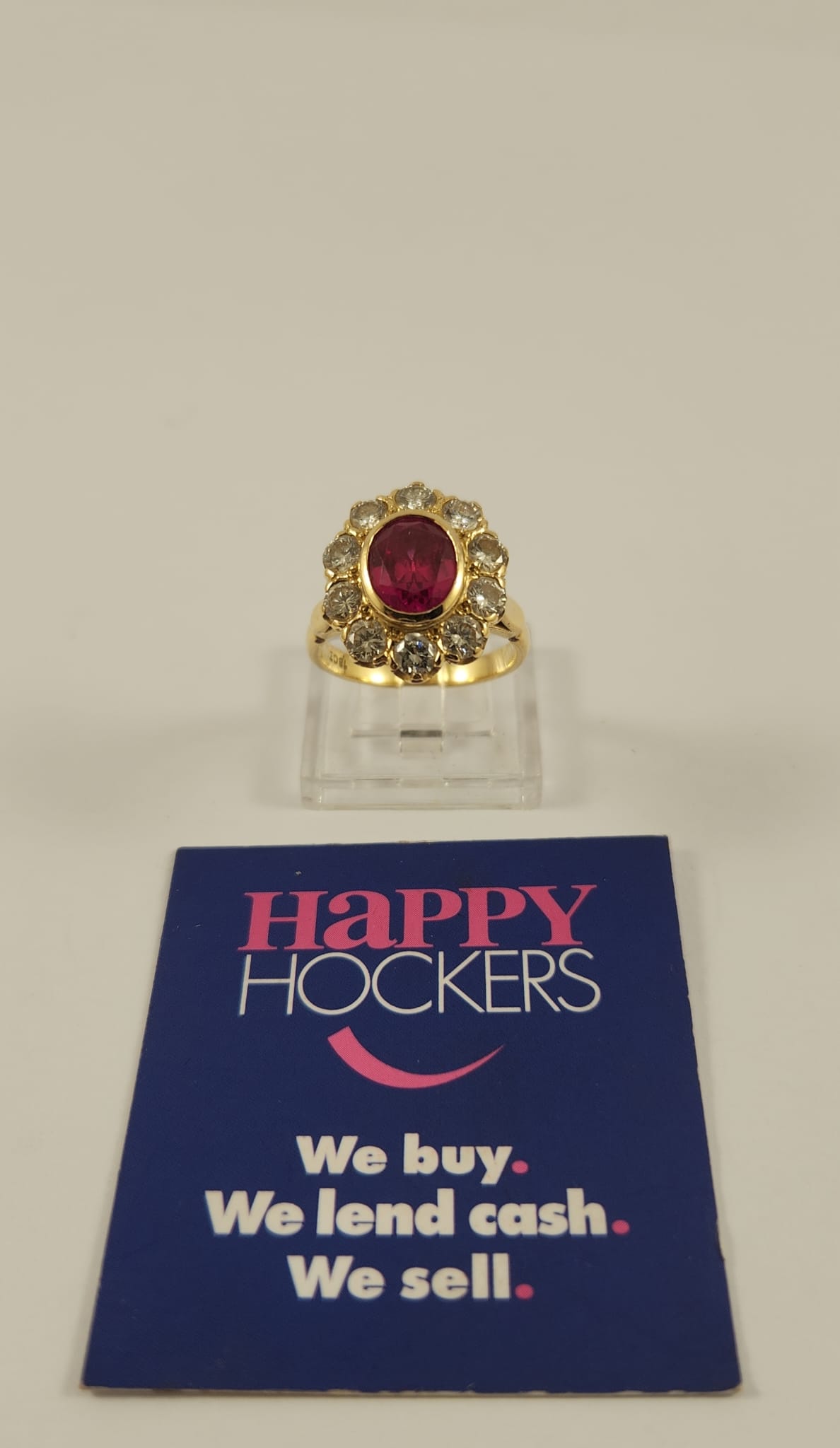 18CT YELLOW GOLD RING SET WITH SYNTHETIC RUBY AND 10 X NATURAL DIAMONDS TOTALLING 1.20CT