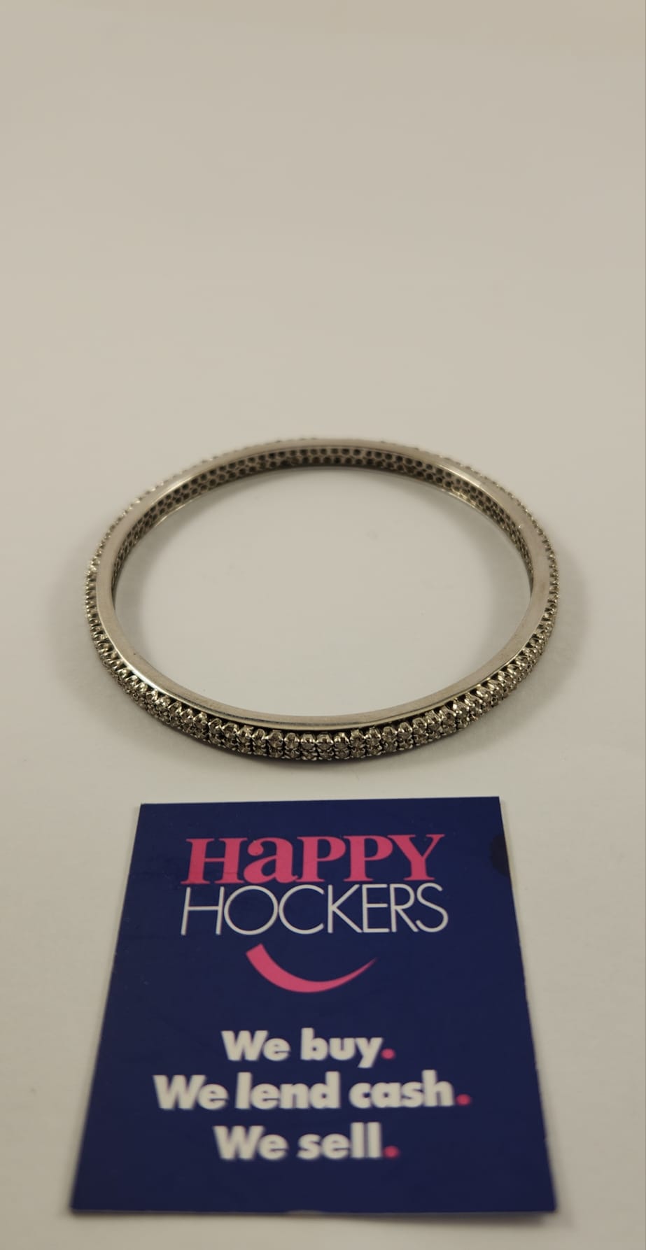 18CT WHITE GOLD FIXED BANGLE SET WITH 216 DIAMONDS TOTALLING 4.32CT