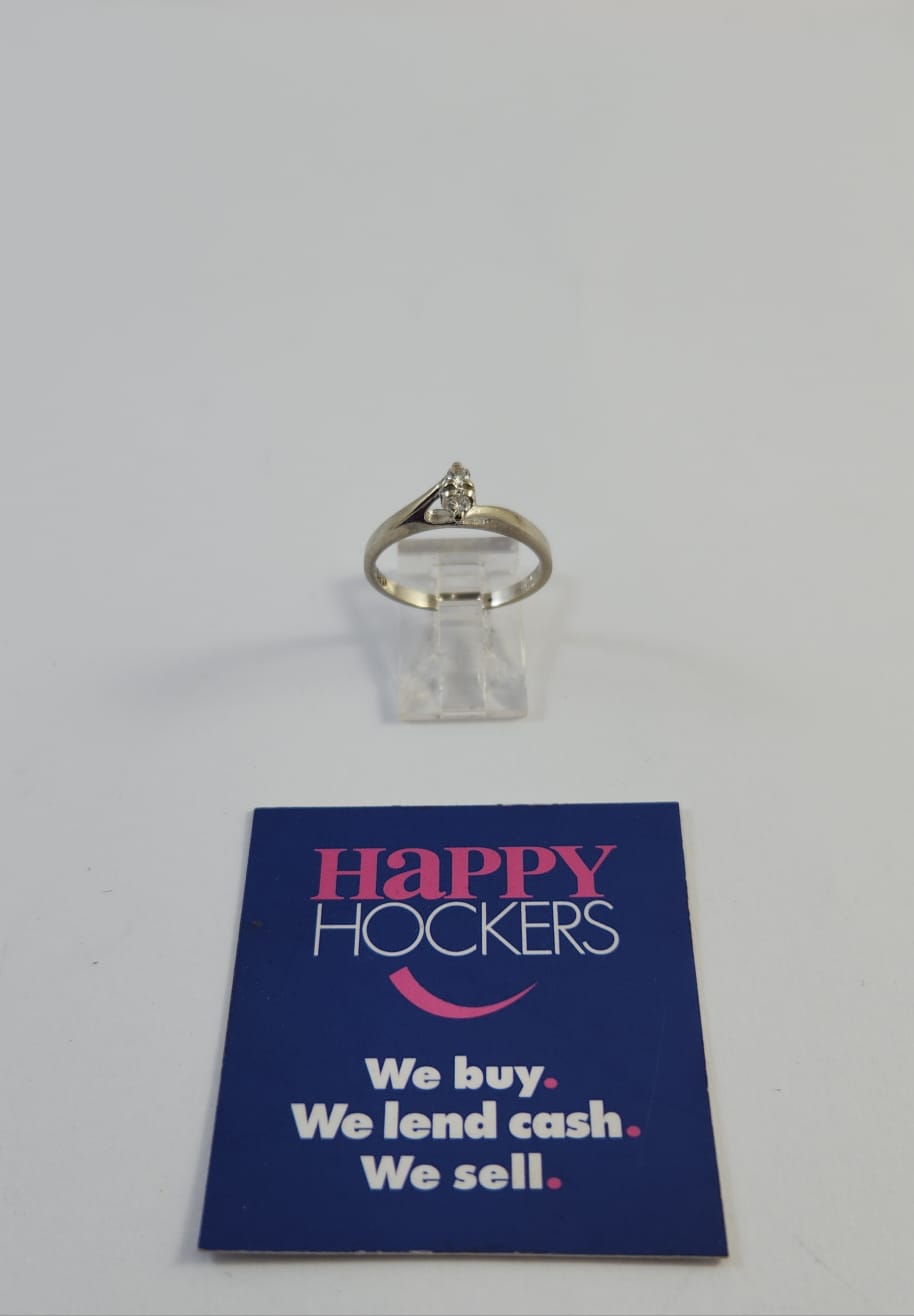 14CT WHITE GOLD DRESS RING SET WITH 2 X 0.03CT DIAMONDS. WEIGHT 2.1 GRAMS