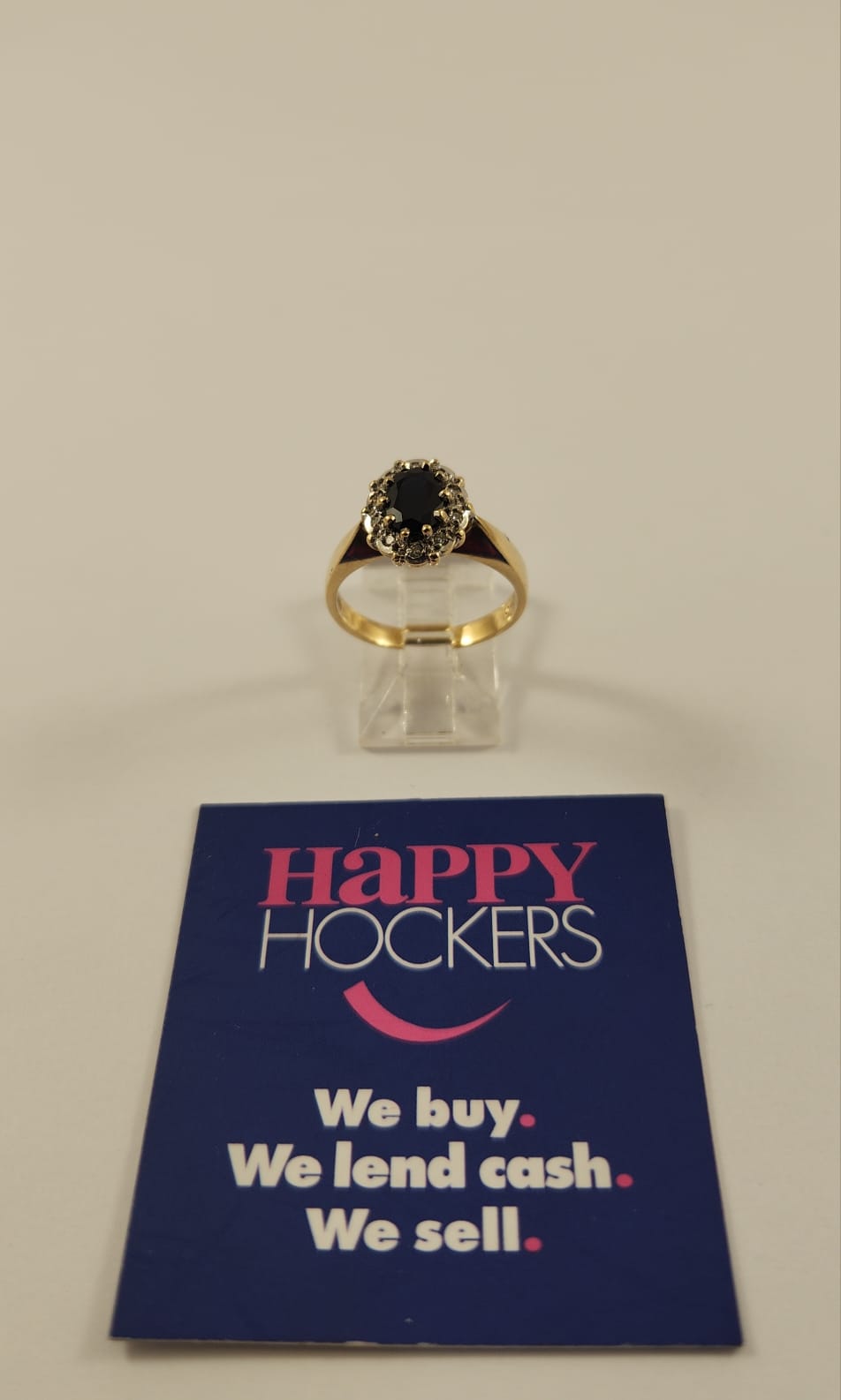 9CT YELLOW GOLD RING WITH SAPPHIRE AND 10 DIAMONDS TOTALLING 0.10CT