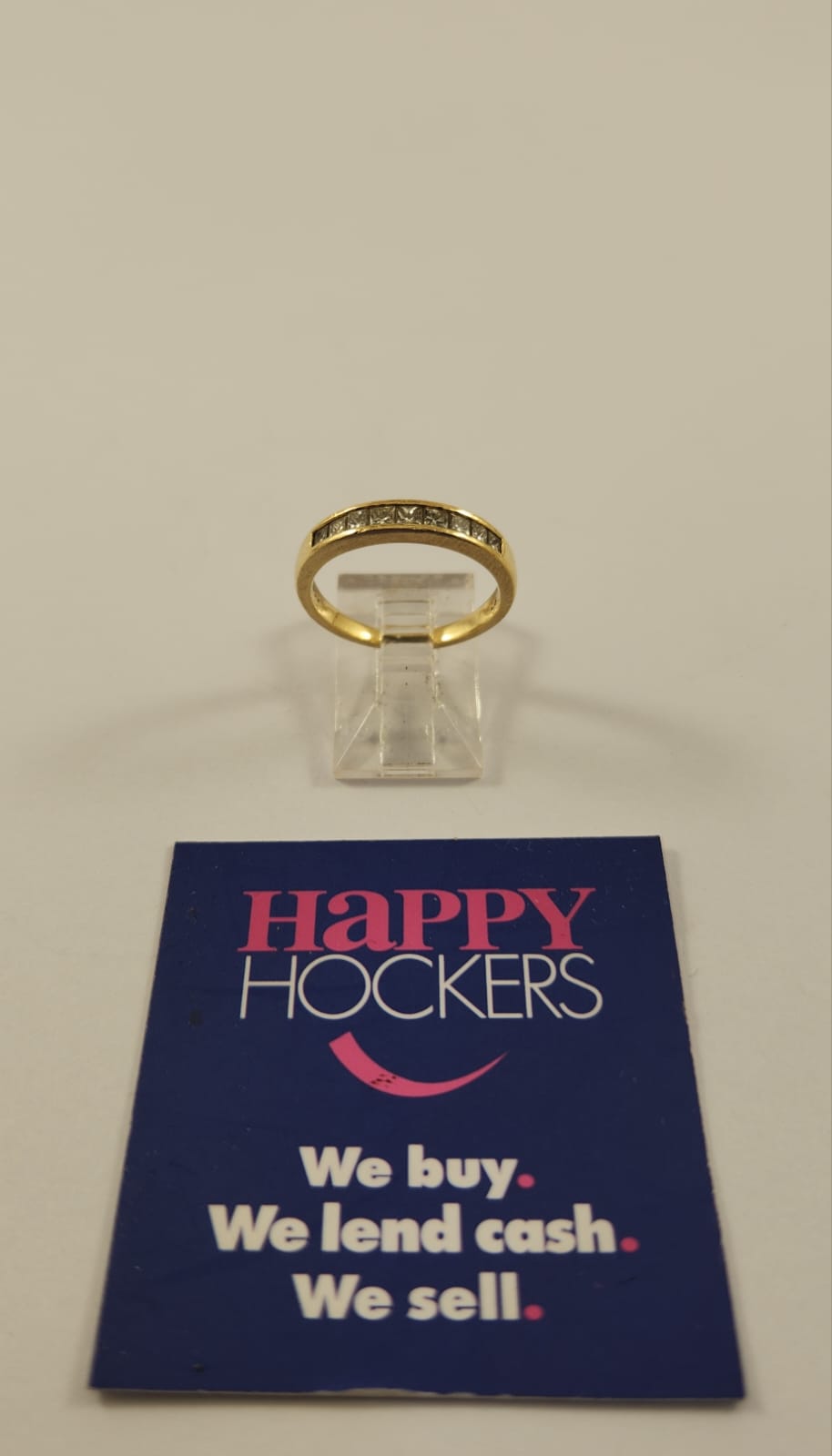 18CT YELLOW GOLD RING SET WITH 9 X 0.04 DIAMONDS