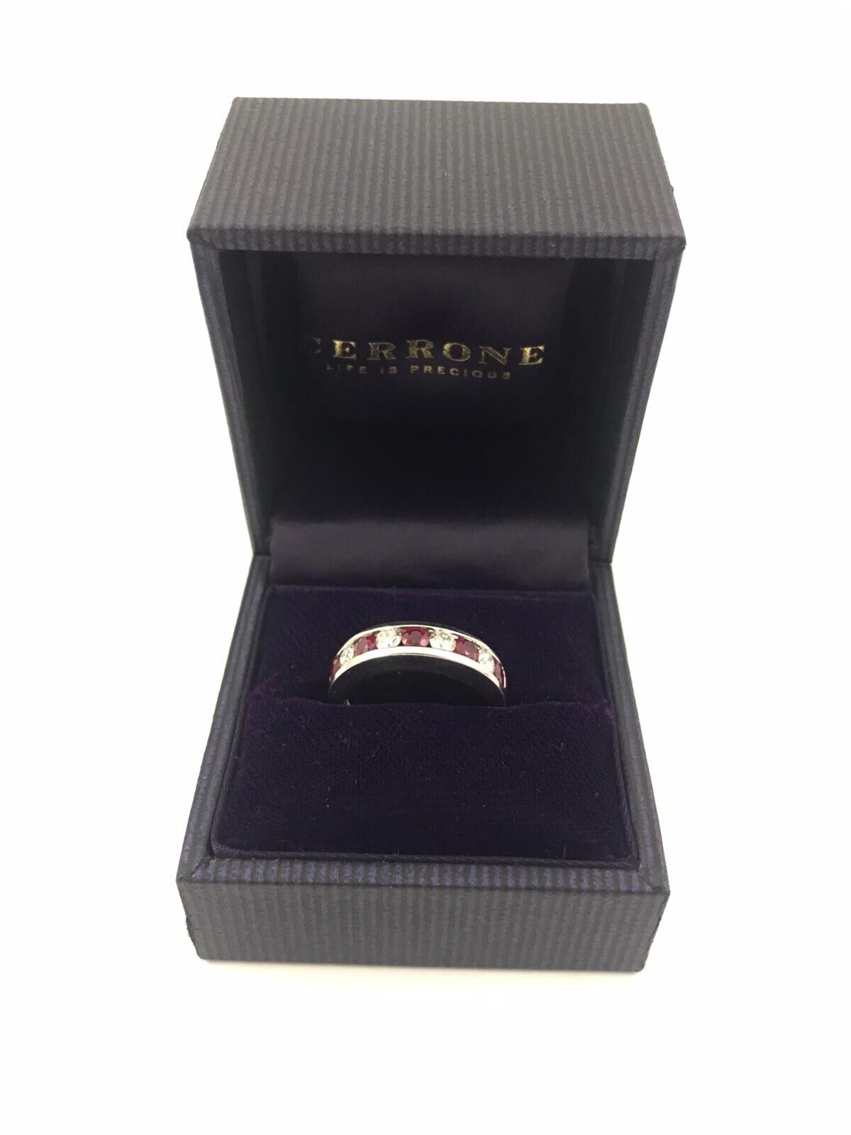 18CT WHITE GOLD CERRONE ETERNITY RING CHANNEL SET WITH DIAMONDS AND NATURAL RUBIES