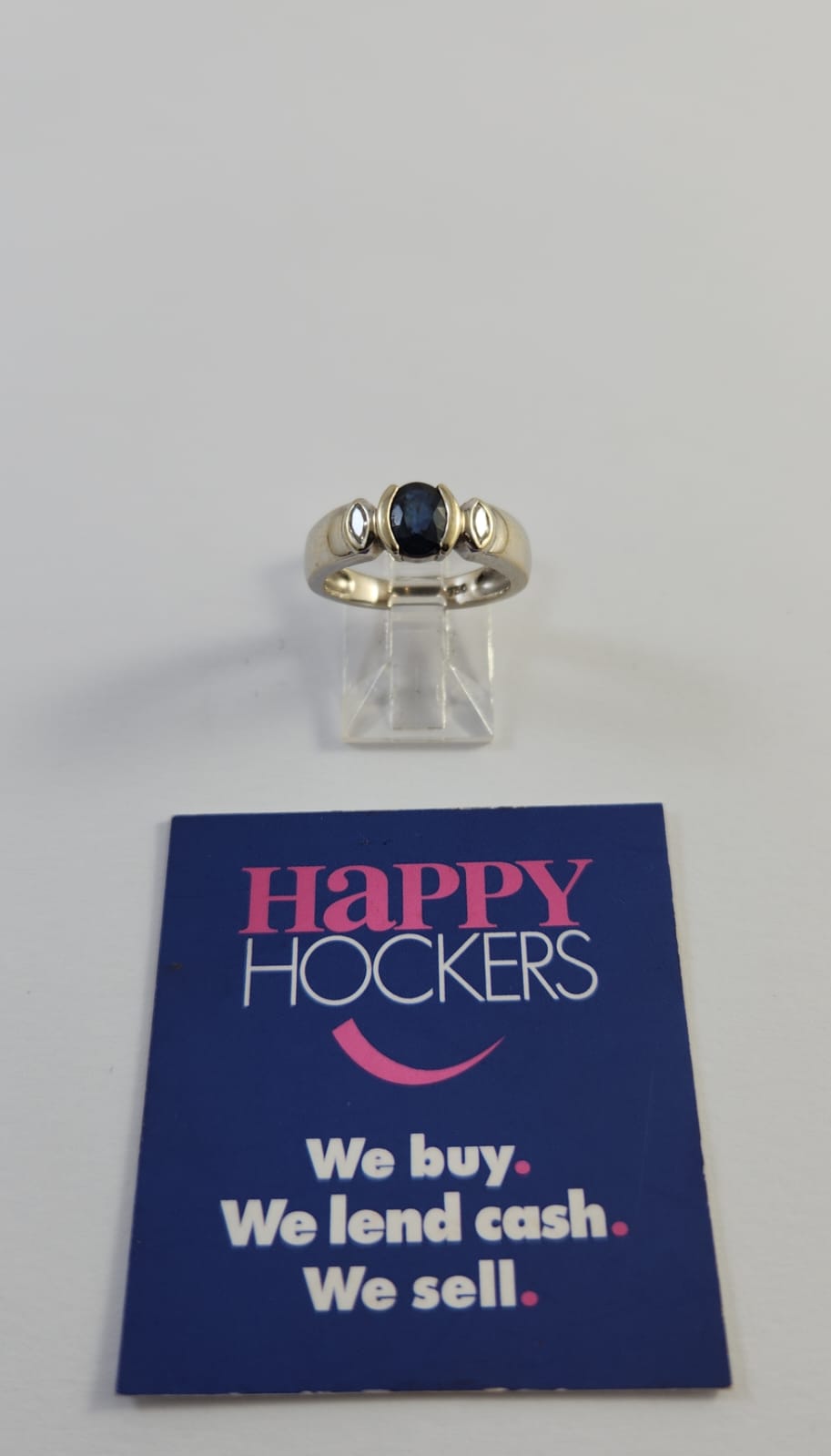 18CT WHITE GOLD RING SET WITH A SAPPHIRE AND 2  MARQUISE DIAMONDS
