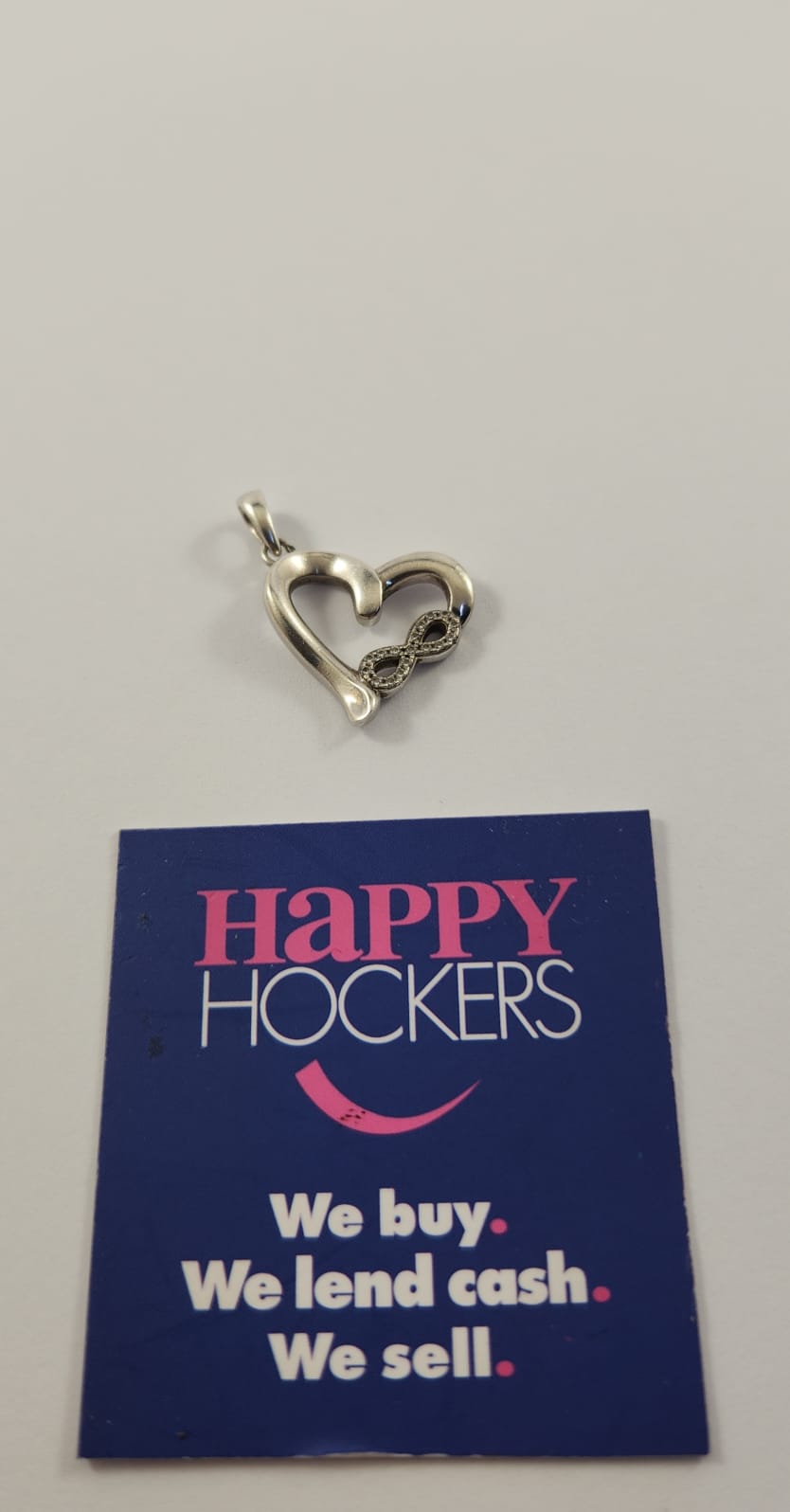 STERLING SILVER HEART SHAPED PENDANT SET WITH CUBIC ZIRCONIAS