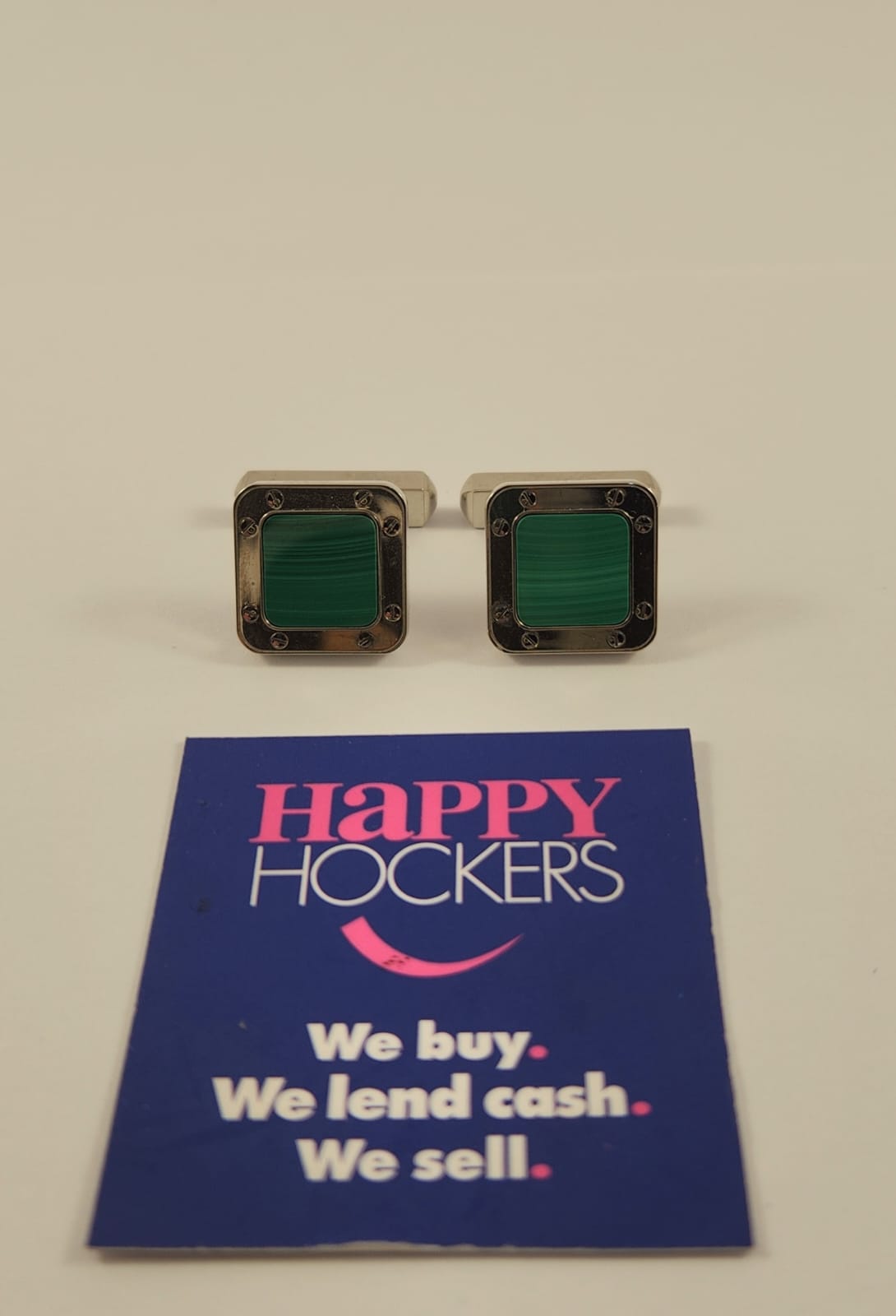 CARTIER STERLING SILVER AND ENAMEL CUFFLINKS