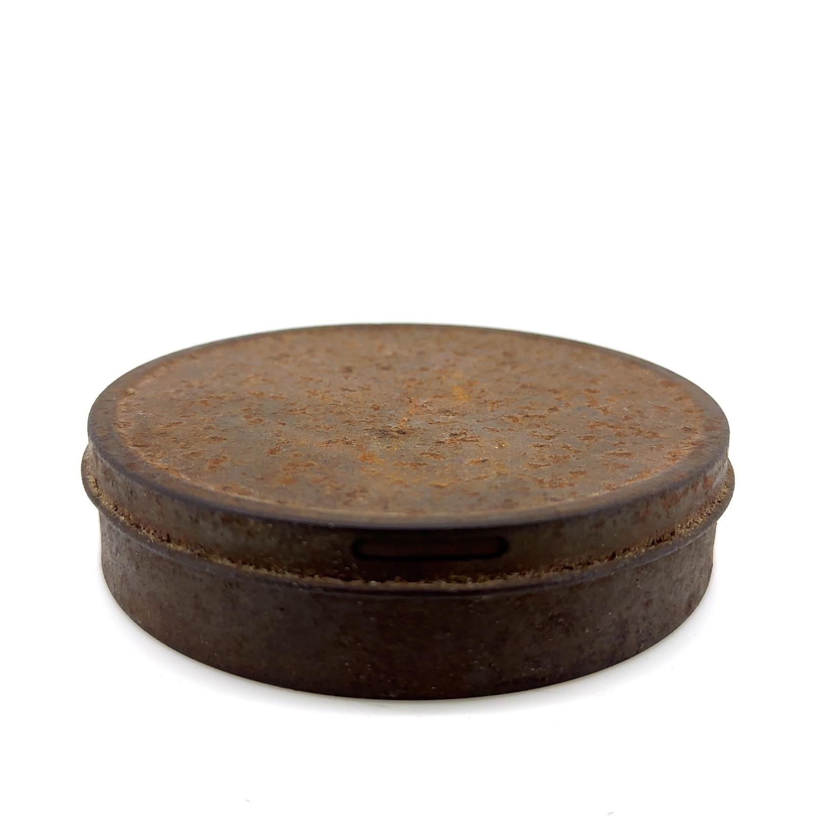 VINTAGE ROUND TOBACCO TIN