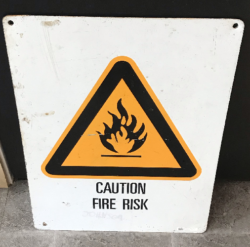 CAUTION FIRE RISK TIN SIGN