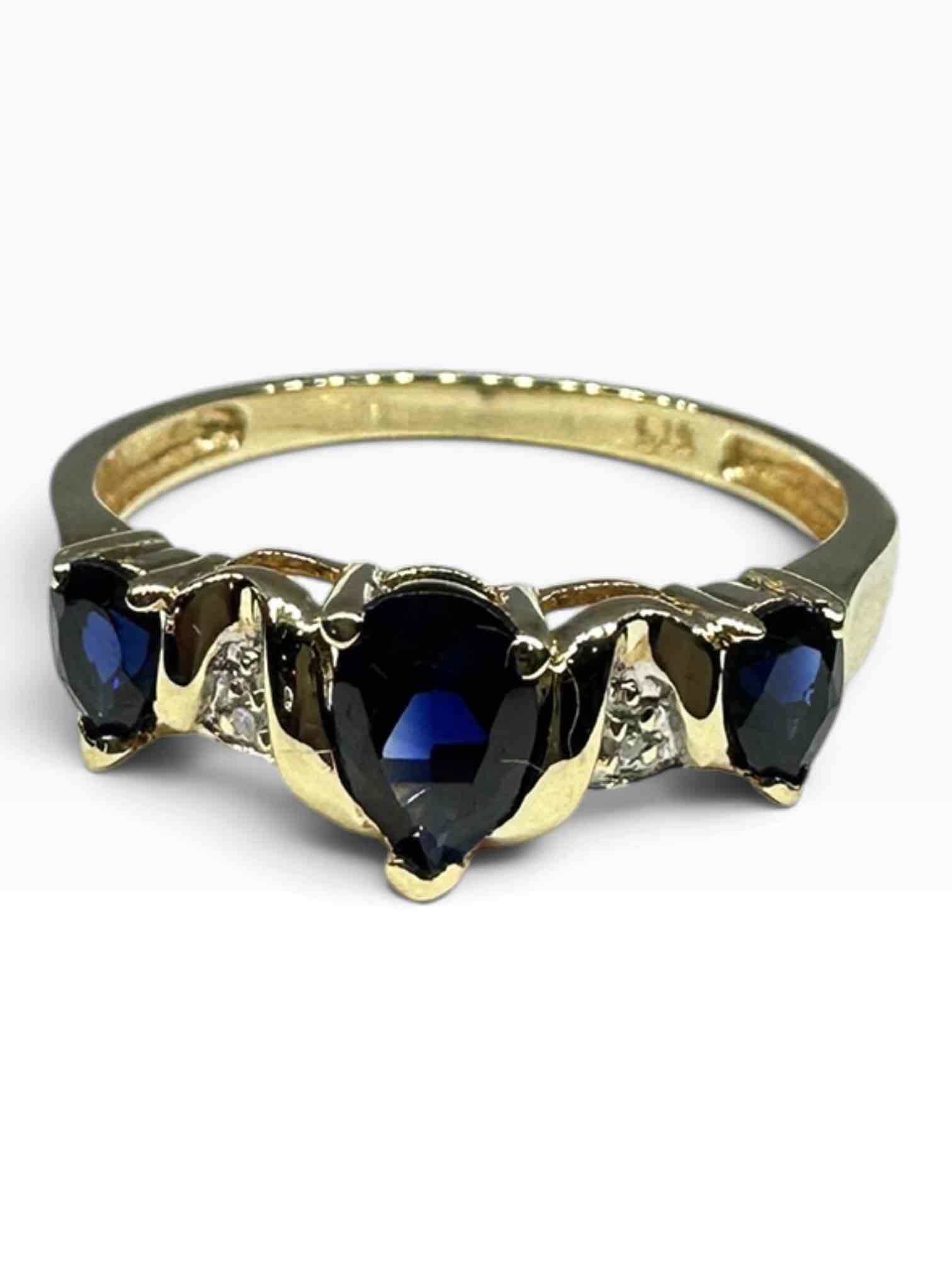 LADIES 9CT YELLOW GOLD RING WITH BLUE STONES